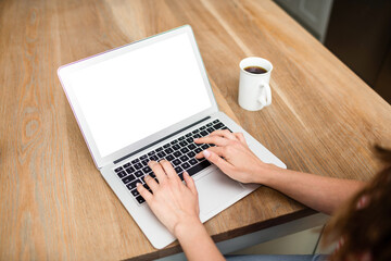 Girl using laptop on table