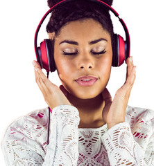 Woman with eyes closed listening music through headphones