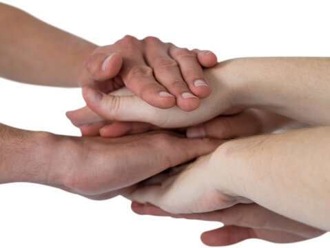 Cropped image of people forming hands stack