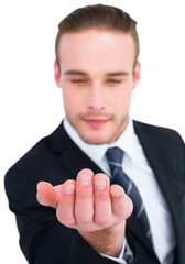 Cheerful businessman holding out his hand