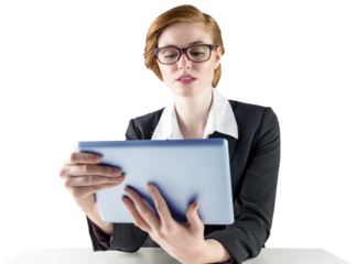 Redhead businesswoman using her tablet pc