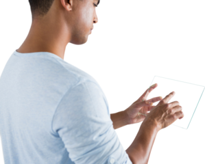 Side view of young man using glass digital tablet