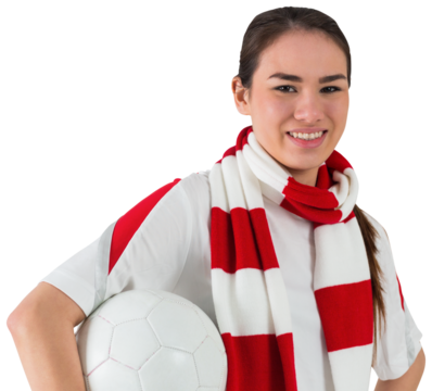 Smiling football fan in white holding ball