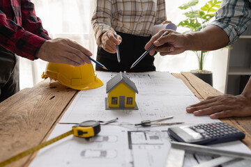Engineer Teamwork Meeting, Architect contractor meetings of real estate brokers and company presidents to select a model to build a housing estate in writing and presenting to state organizations.