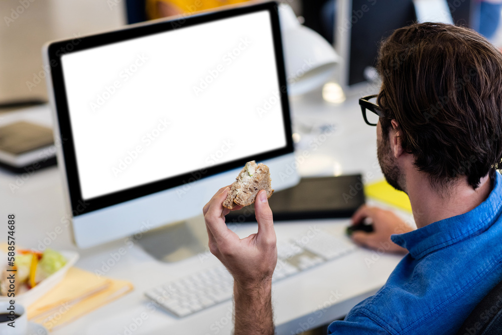 Poster high angle view of man working on computer