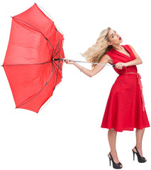 Elegant blonde holding umbrella