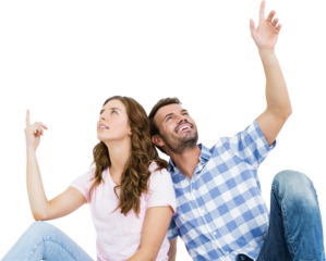 Young couple looking up and smiling