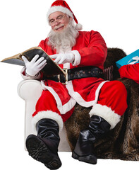 Santa reading bible with bag of Christmas present