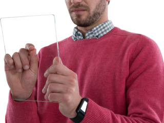 Mid section of man using glass digital tablet