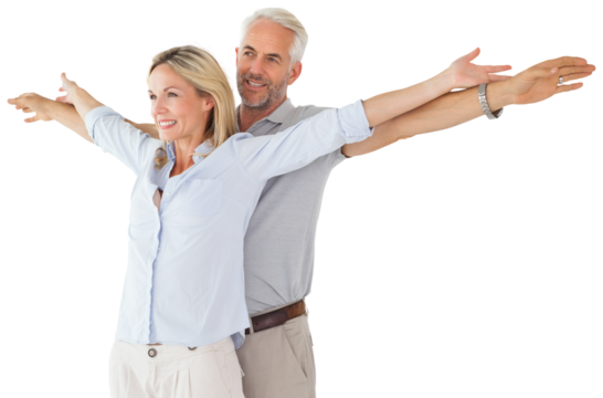 Happy couple standing with arms outstretched