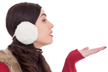 Brunette in winter clothes with hand out