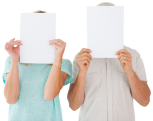 Couple holding paper over their faces