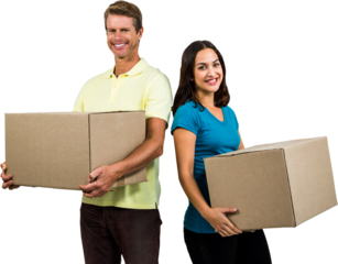 Portrait of smiling couple holding cardboard boxes