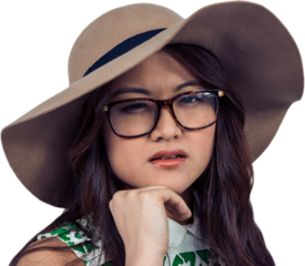 Asian woman with hand on chin wearing hat