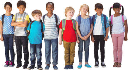 Cute pupils smiling at camera by the school bus