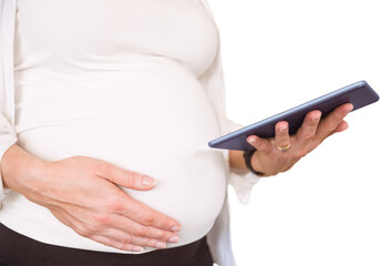 Midsection of pregnant woman using tablet computer