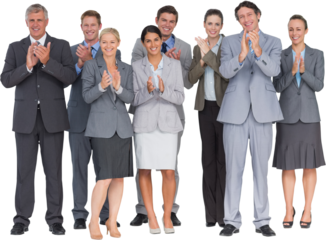 Smiling business team applauding at camera