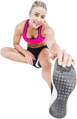 Fototapeta premium Portrait of smiling woman touching toe