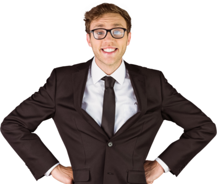 Young geeky businessman smiling at camera 