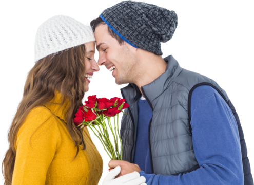 Happy couple holding flower bouquet