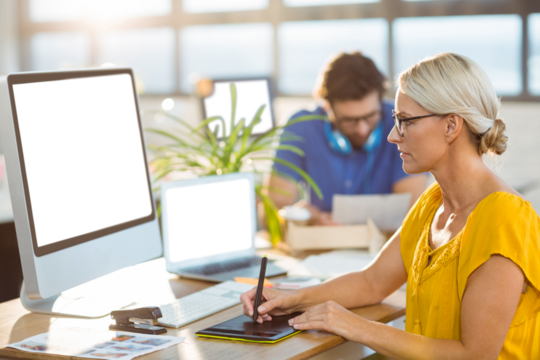 Graphic designers working in office