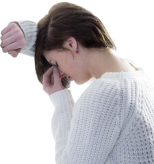 Sad pretty brunette leaning against wall