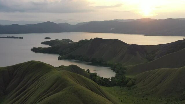 Aerial Shot a Beautiful Sunrise of the Teletubbies Hills at Jayapura Papua