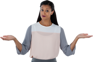 Frowning businesswoman shrugging her shoulders