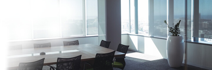 Empty chairs and table in office