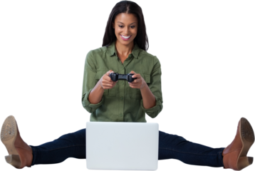 Woman playing video game on laptop against white background