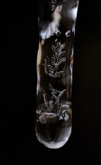 close up, macro of air bubbles in icicle forming organic abstract shapes, black background