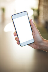 Woman showing mobile phone