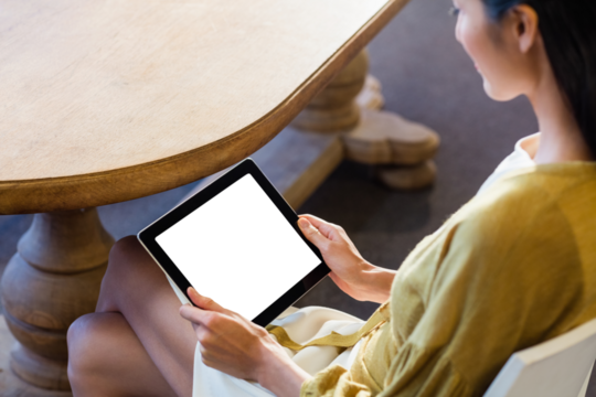 Young woman using digital tablet