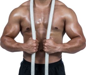Muscular man with battle rope