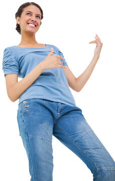 Pretty brunette playing air guitar