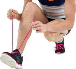 Athlete tying her shoe lace