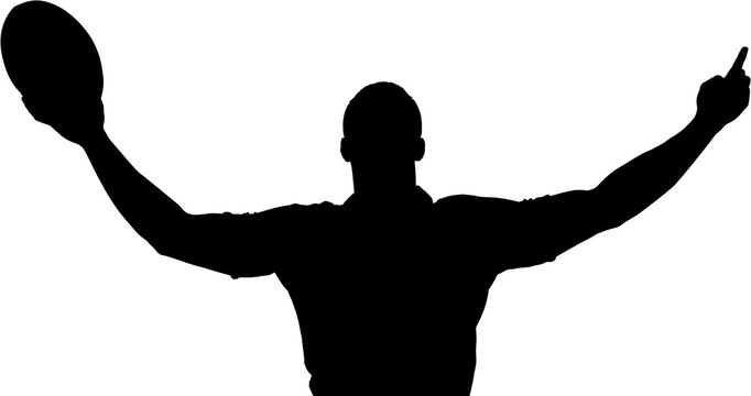 Rugby player holding ball with arms outstretched