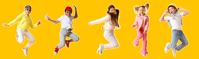 Set of jumping little children on yellow background