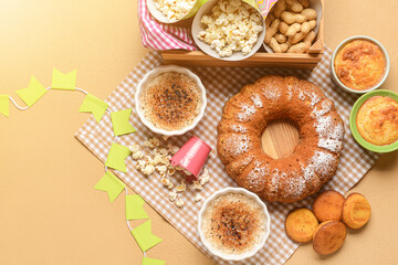 Traditional food for Festa Junina (June Festival) on beige background