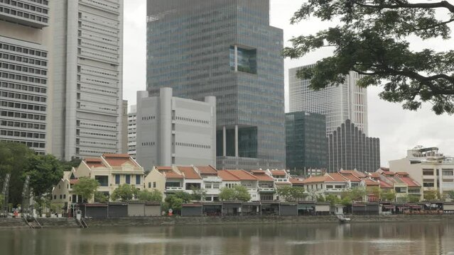 view among the district of clarke quay, a famous night life area,  in the city of singapore while in daytime