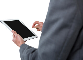 Mid section of businessman using digital tablet