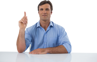 Male executive pressing an invisible virtual screen