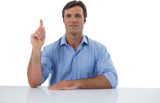 Male executive pressing an invisible virtual screen