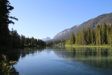 Fototapeta na wymiar Reflections On The River, Banff National Park, Alberta