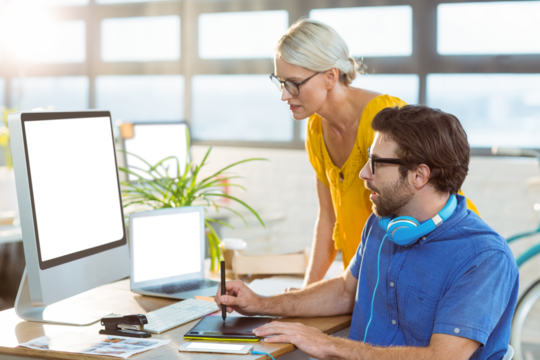 Graphic designers using tablet