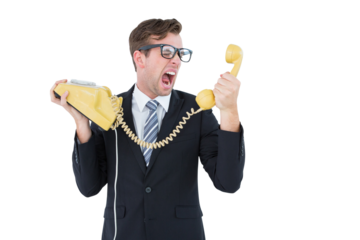 Geeky businessman shouting at telephone
