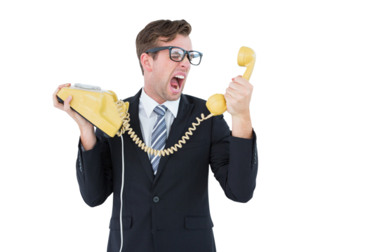 Geeky businessman shouting at telephone