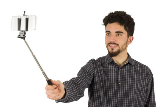 Casual man using a selfie stick