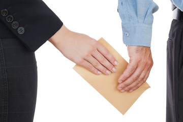 Business people passing envelope