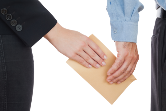 Business people passing envelope